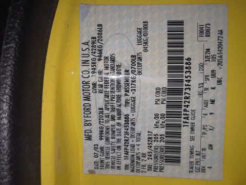 2003 Ford Mustang - This Ford VIN plate shows a manufacturing date of 07/03 and a VIN ending in 453886.