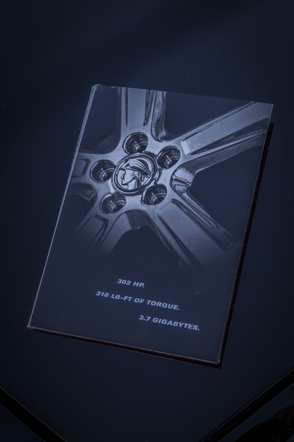 Mercury Marauder brochure cover with wheel center cap and 302 HP, 318 LB-FT of torque text