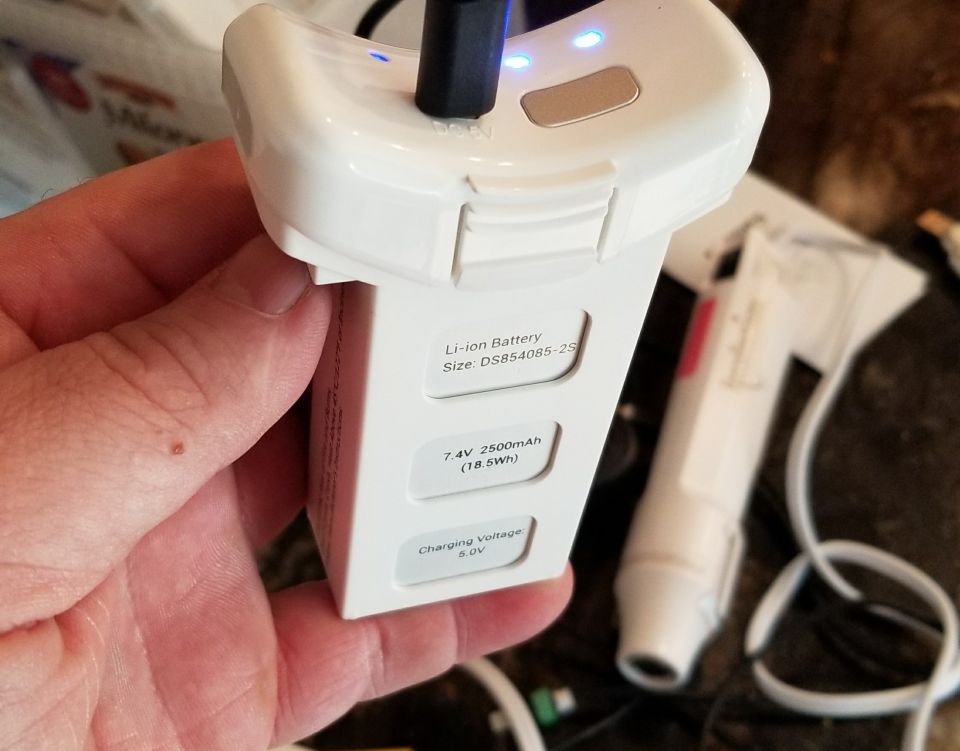The smart battery charges by micro USB, but the "size" number ( DS854085-2S ) doesn't correspond to anything Google can find, other than technical reports.