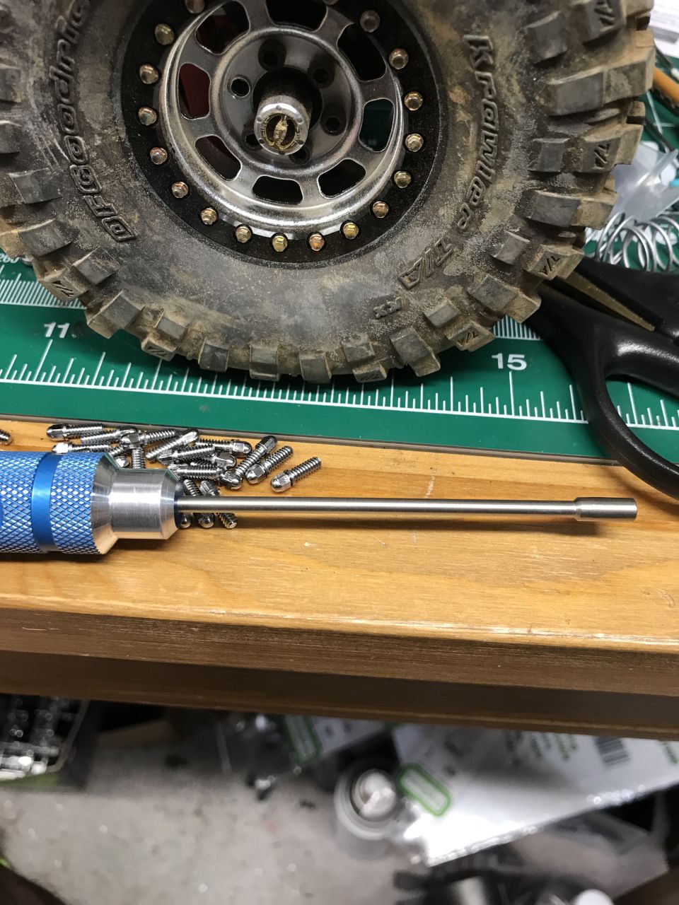 Off-road tire and wheel with hex driver and screws