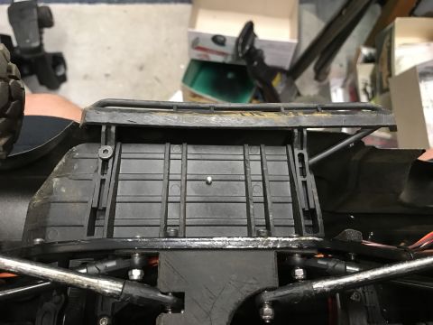 1989 Ford Bronco - Close-up view of an RC car's chassis, showing the roof rack and suspension system.