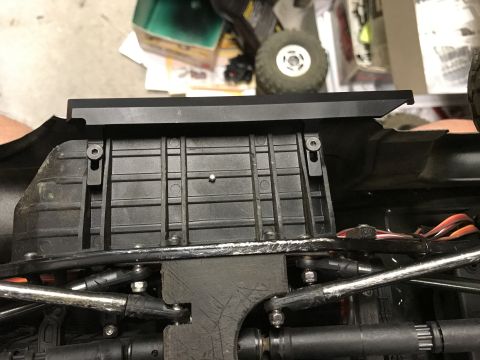 1989 Ford Bronco - Underside view of an RC car chassis, showing suspension and drive train components.
