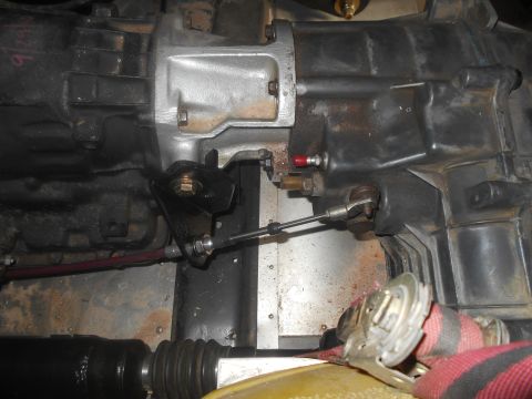 1992 Ford Bronco - Close-up view of the transmission linkage and associated hardware.