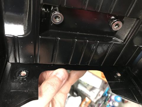 1989 Ford Bronco - Interior trim piece with visible bolts and mounting holes.