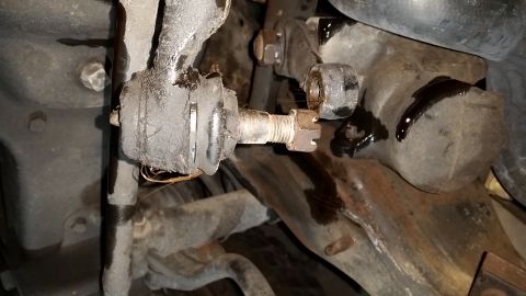 1996 Ford Bronco - The inner tie rod has been removed, and the nut holding the pitman arm is loose. There is no room for my pitman arm puller, so the gear mus…
