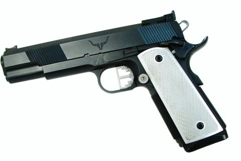 1996 Ford Bronco - A black semi-automatic pistol with silver grips is shown against a white background.