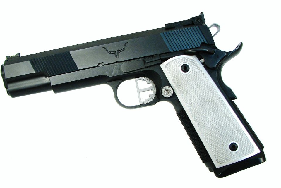 Black pistol with silver textured grips and a bull logo on the slide