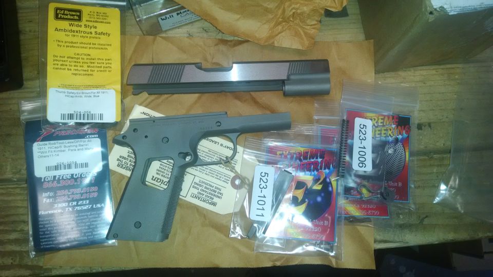 Gun frame and slide with various parts and packaging