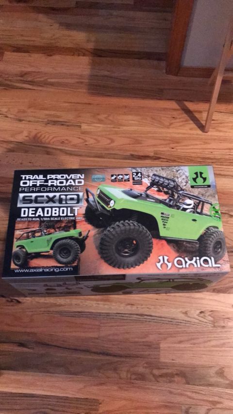 1989 Ford Bronco - The box displays an image of a green remote-controlled off-road vehicle, not a 1989 Ford Bronco.