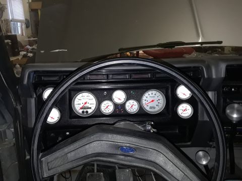 1985 Ford Bronco - Aftermarket gauge cluster installed in a 1985 Ford Bronco interior.