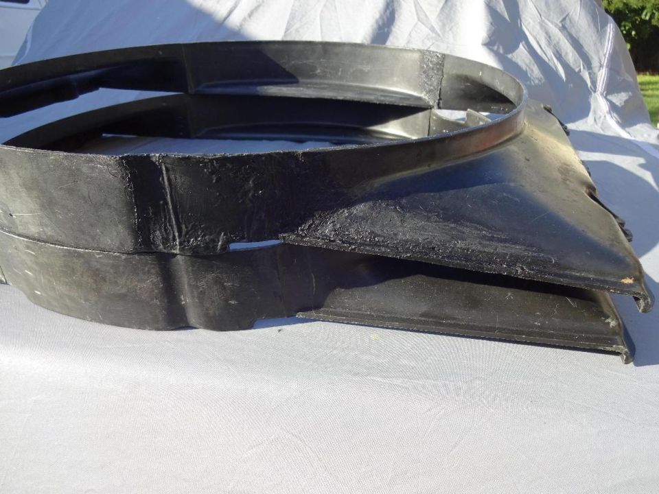 Black plastic radiator fan shroud, appears to be for a classic car