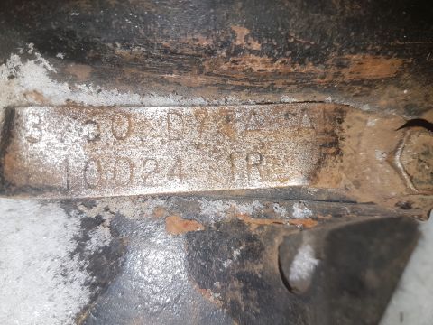 1995 Ford F-150 - Close-up of an axle casting showing stamped identification numbers.