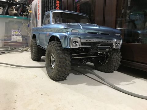 1989 Ford Bronco - This RC model pickup truck features a 1966 Chevrolet grille and oversized off-road tires.