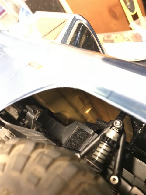 1989 Ford Bronco - Close-up view of a model car's interior, highlighting the suspension and steering mechanisms.