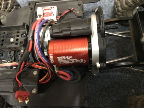 1989 Ford Bronco - Close-up of a red ROC 412 electric motor, labeled with 3100KV.