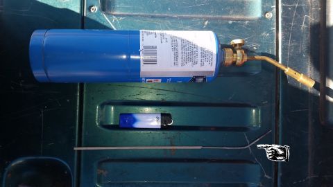 1996 Ford Bronco - Here are the tools I used to mark the position of the screw holes on the inside of the truck. You'll see a blow torch and a piece of weldin…