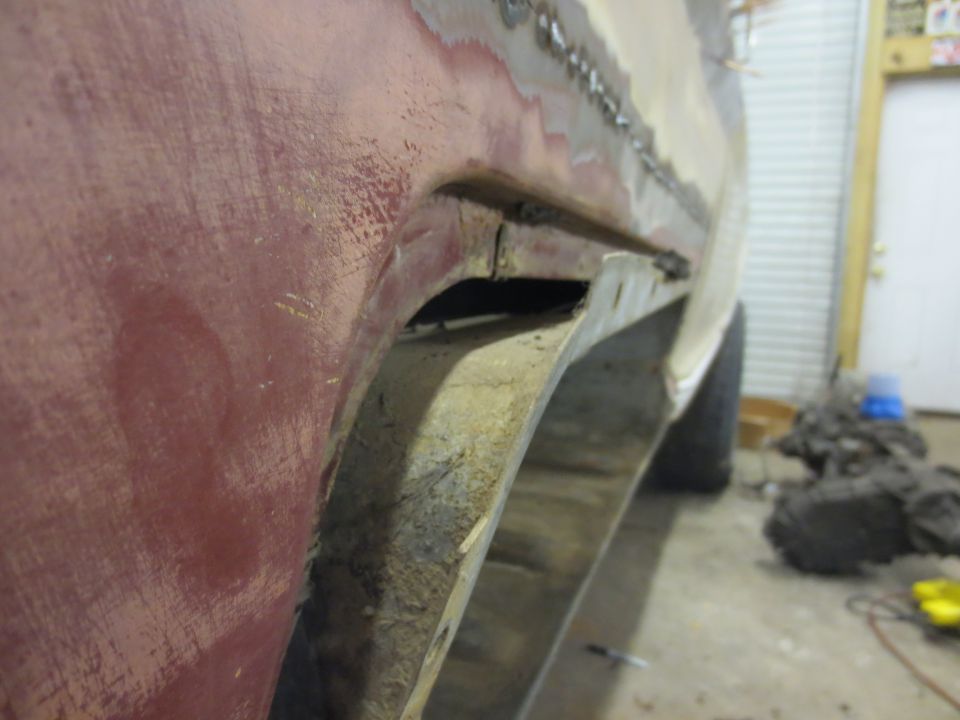 1967 Ford F-250 side view of rusty wheel well and fender repair