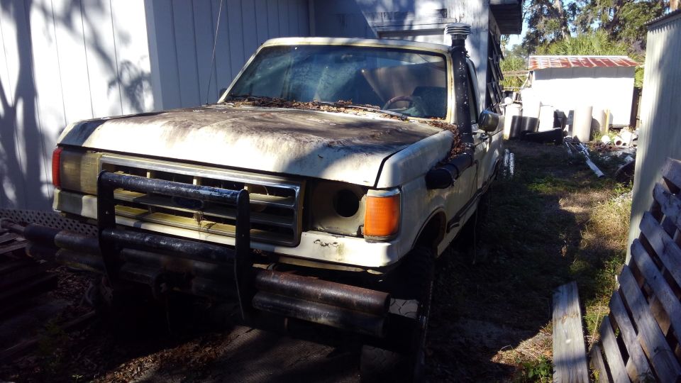 so after 2.5 years of hiatus from Project Possessed which never got done, i figured it finally time to get this ol truck back in business. as you can tell its been very neglected. so start of Project Revive is now taking over.

so to start things off i wanted to have the truck so its able to be wheeled around and higher off the ground for working underneath. this will help and hurt with that aspect but at least seeing good tires under it again will motivate me to continue.