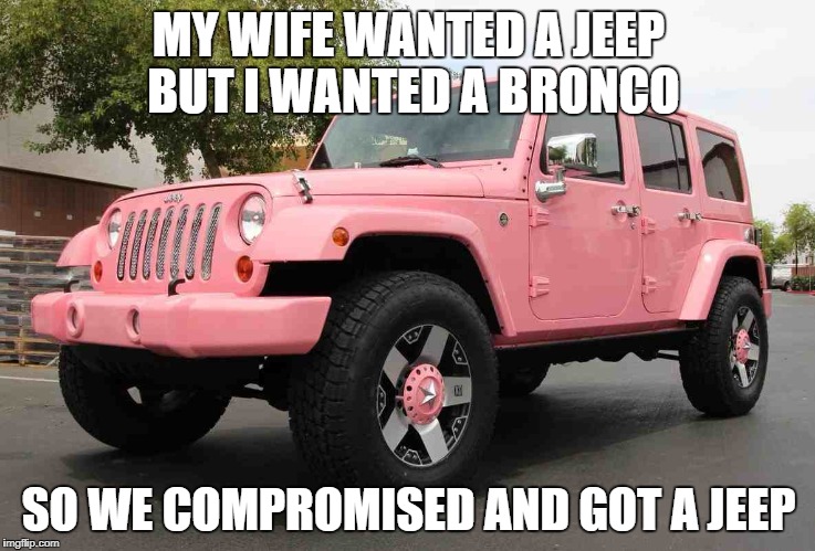 Pink Jeep Wrangler with custom wheels and text overlay