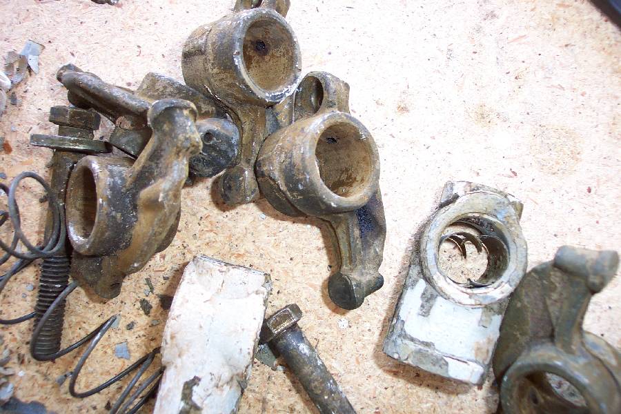 All the rocker shaft parts after tanking.  Not all parts survived.