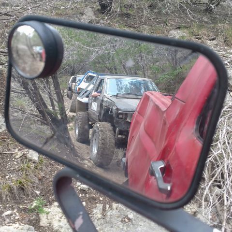 1989 Ford Bronco - April wheeling trip, line of toys behind me on our first trail ride!