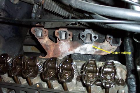 1992 Ford Bronco - I guess this should have given away that there was some coolant coming out of #6. It was caked all around the exhaust port when I pulled th…