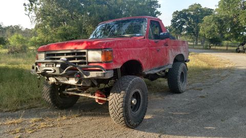 1989 Ford Bronco - Easter Carnage. bent tie rod, bent fog light mount, busted fog light!
