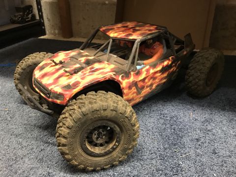 1989 Ford Bronco - This remote-controlled rock crawler features a flame graphic paint scheme and aggressive off-road tires.