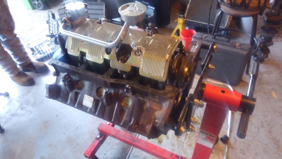 engine block is a standard 351w non-roller i bought from a friend. it was previously rebuilt by a company in the past at some point but the bearings were very worn but the block and crank were still in decent condition

luckily with new main,rod and cam bearings the clearances were all within spec, the rings were a tiny bit loose but everything should do good. the cylinders were hones with a flexball hone

i reused a set of main cap studs that are designed to use a windage tray so i went ahead and added one. oil pump is stock with a hardened shaft