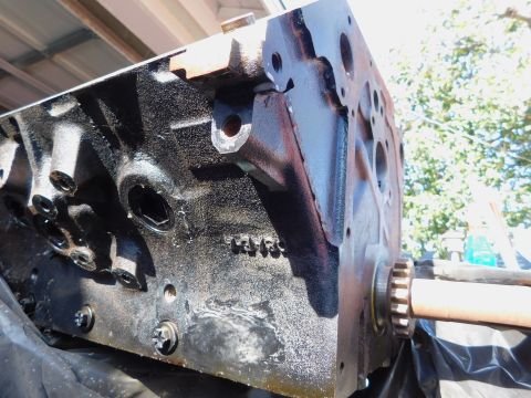 1968 Mercury Cougar - Close-up of an engine block, showing casting marks and a portion of the crankshaft.