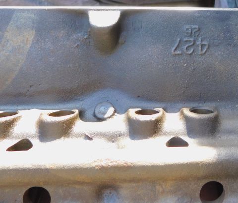 1968 Mercury Cougar - This is a close-up view of an engine block casting, showing stamped numbers.