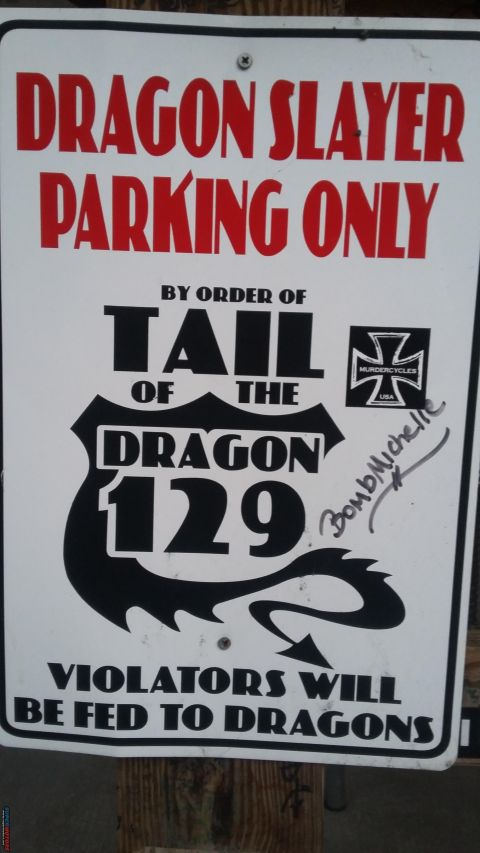2000 Pontiac Grand Prix - This sign indicates parking restrictions and a warning for violators, referencing the Tail of the Dragon 129.