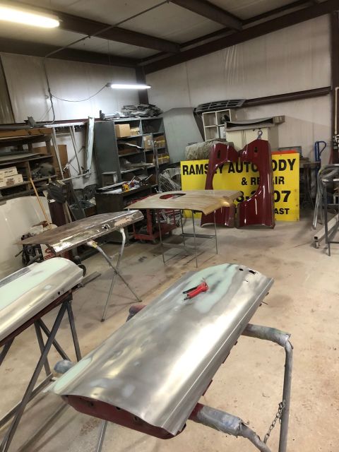 1968 Mercury Cougar - Car body panels are prepped for repair in a workshop, with a sign for Ramsey Auto Body visible in the background.