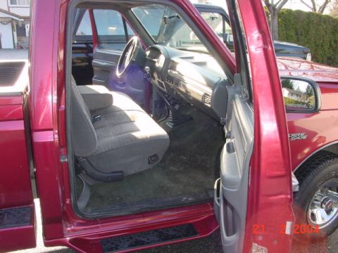 1992 Ford F-150 - Interior view of a 1992 Ford F-150, with the driver's side door open.