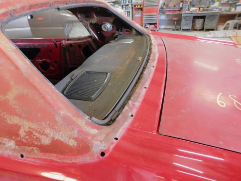 1968 Mercury Cougar - The interior and hood of a red 1968 Mercury Cougar show signs of wear, with "68" chalked on the hood.