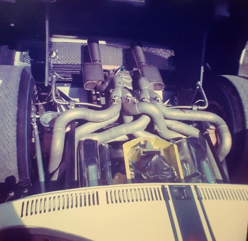 Engine with custom exhaust pipes and dual mufflers
