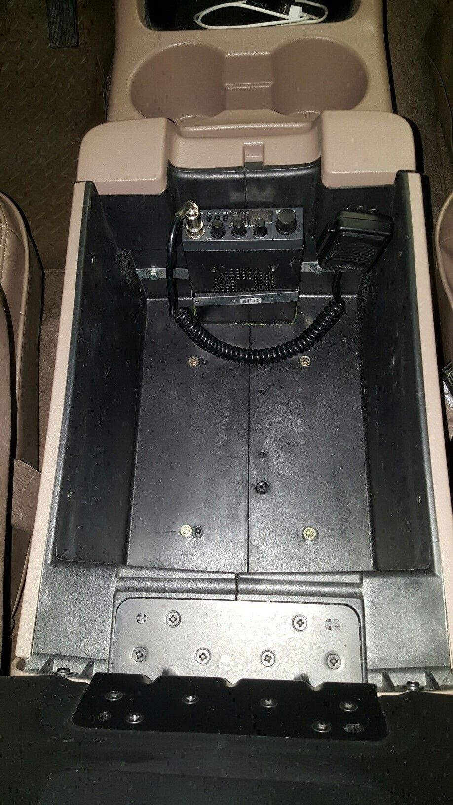 Center console interior with CB radio and microphone installed