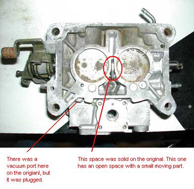 1979 Ford Bronco - A close-up view of a carburetor part, with annotations highlighting specific internal features and modifications.