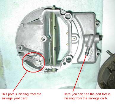 1979 Ford Bronco - Carburetor part identified as missing from a salvage yard carb, with website www.supermotors.net visible.
