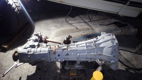 1988 Ford Bronco - because the engine went in soo well, we decided we should go ahead and get the tranny and t-case in. using my neighbors motorcycle jack i w…
