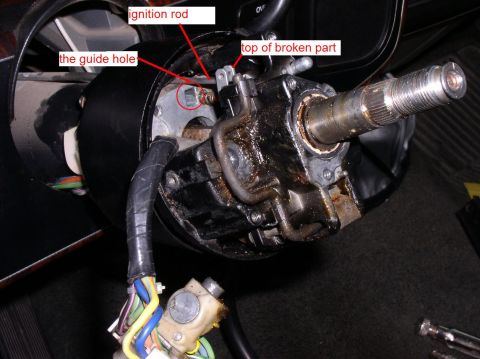 1990 Ford Bronco - Steering column ignition switch mechanism showing a broken part and labeled components.