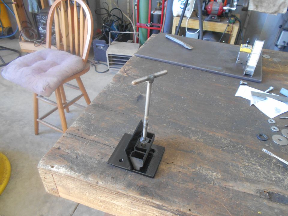 Workbench with jig and wooden chair