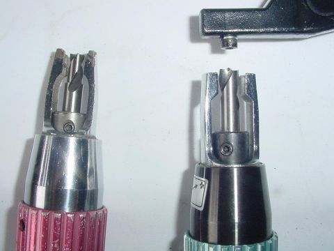1967 Mercury Cougar - A metal tool is positioned above two countersink bits, one with a pink handle and the other with a teal handle.