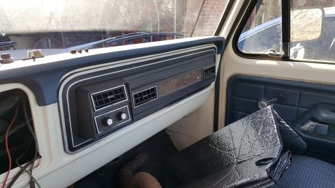 1973 Ford F-100 - Interior view of a 1973 Ford F-100 dashboard and door panel.