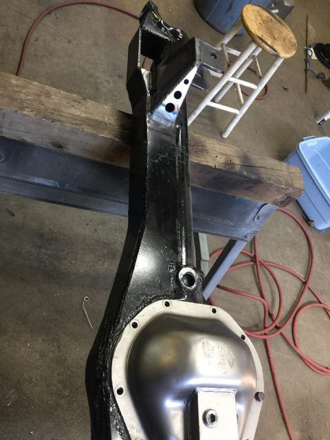 1979 Ford Bronco - A modified front axle housing with a newly installed differential cover is shown.