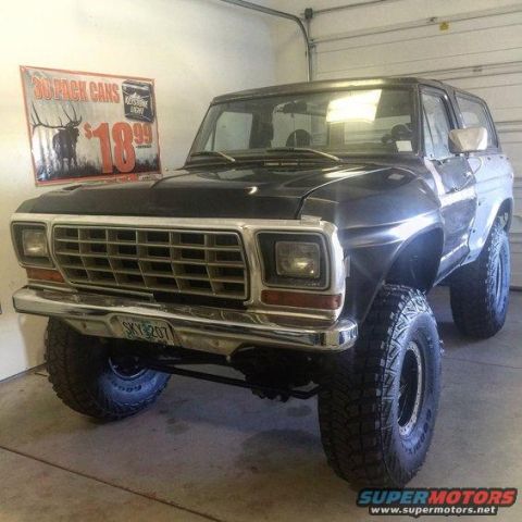 1979 Ford Bronco - This 1978 Ford Bronco features a prominent grille and large tires, suggesting off-road modifications.