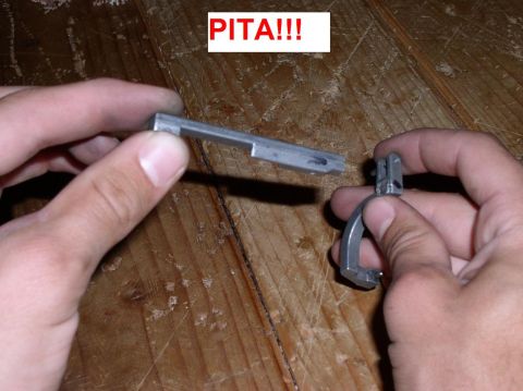 1990 Ford Bronco - Hands hold a metal car part, with text overlay indicating it is a problem.