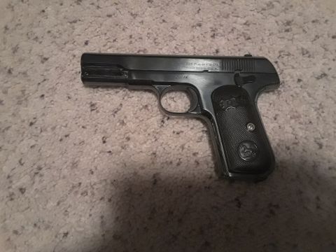 1994 Ford Bronco - Colt 1903 Pocket Hammerless pistol with "PAT. MAY 29. 1900" marking.