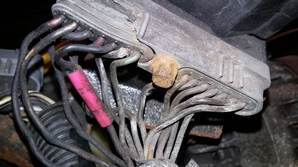 Engine wiring harness with pink electrical tape