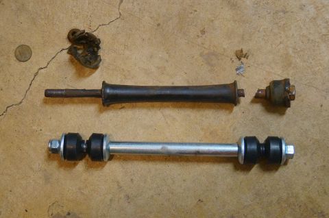 1998 Ford Ranger - Comparison of an old, broken sway bar link with a new replacement part.